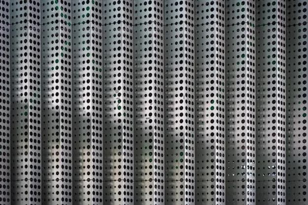 Pleated flymesh accordion screen folding perfectly at the corner of a grand French door opening